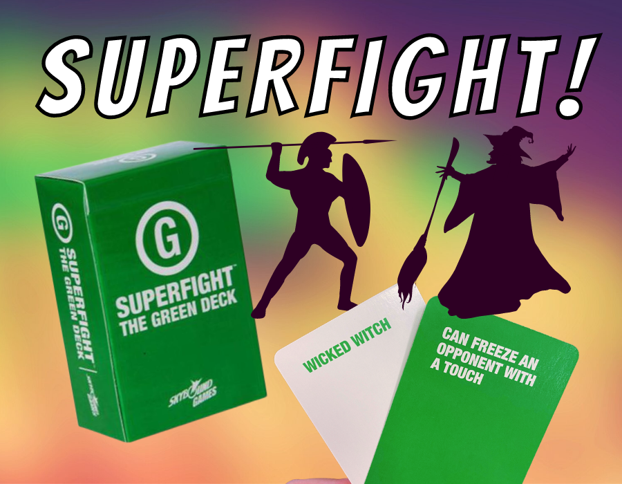 image shows the Superfight Green deck, along with a hand holding two cards--a white one that reads "WICKED WITCH" and a green one that reads "CAN FREEZE AN OPPONENT WITH A TOUCH" There's also a silhouette of a Roman fighting a silhouette of a witch.