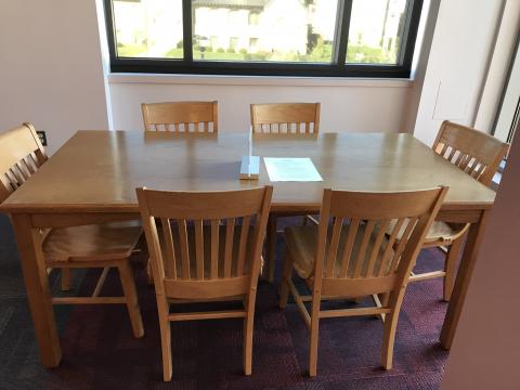 Rectangular table with seating for six.