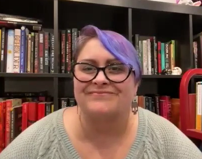 photo of Jody Blanchette, a white woman with glasses and purple hair