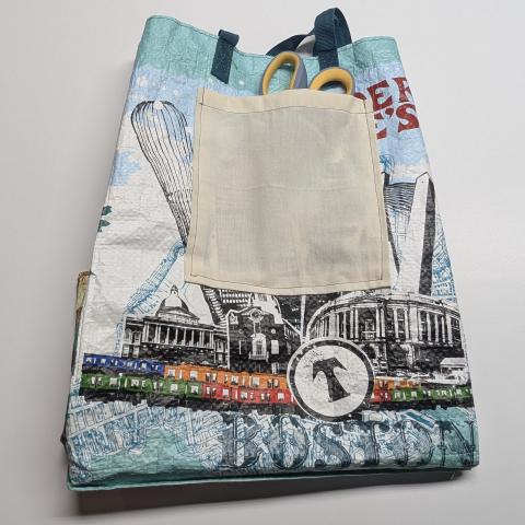 Grocery bag with patch pocket sewn on
