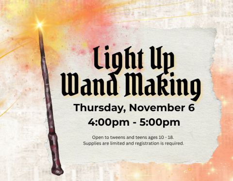 Image of wooder wand with shining at tip on a red and orange background. 