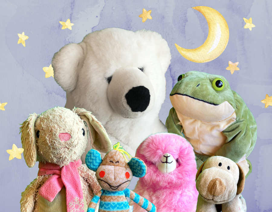 an assortment of stuffies with stars and moon motif in background